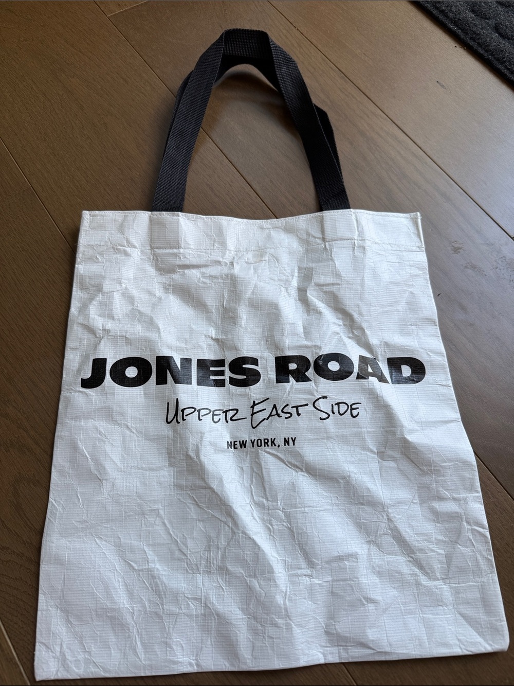 Jones Road White Tote with Black Logo and Handles
